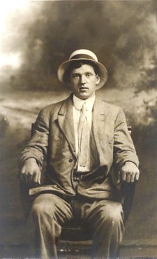 Featured is a real photo postcard image of a well-dressed "dapper" young man ... from head to toe.  The original c 1920 postcard is for sale in The unltd.com Store.